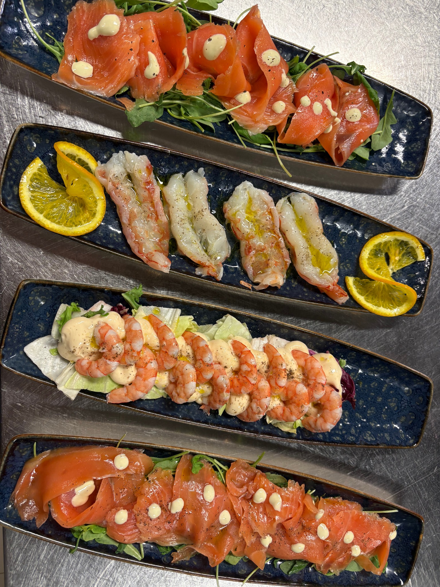 Quattro antipasti di pesce per l’aperitivo da Cibariando